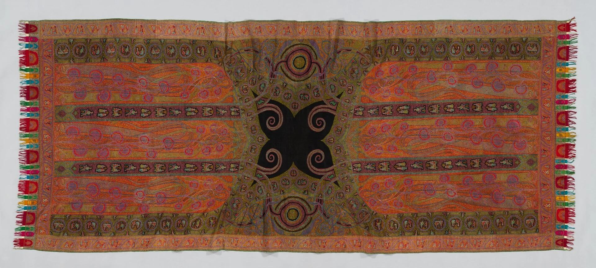 A long Kashmir shawl woven with figures and animals